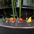4-teiliges Set niedlicher Schnecken-Miniaturen