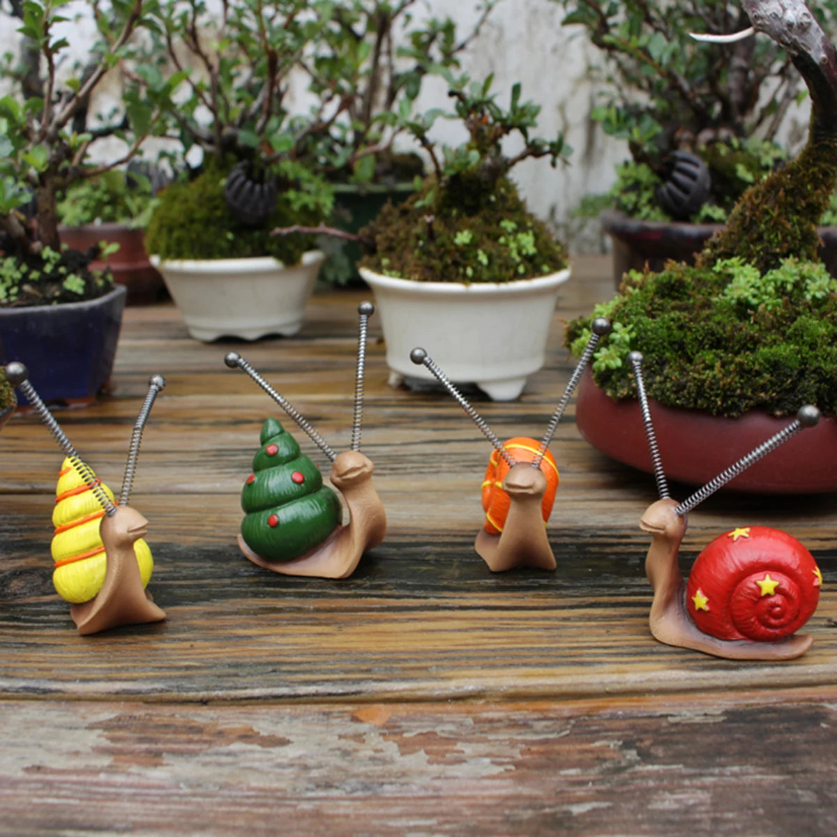 4-teiliges Set niedlicher Schnecken-Miniaturen