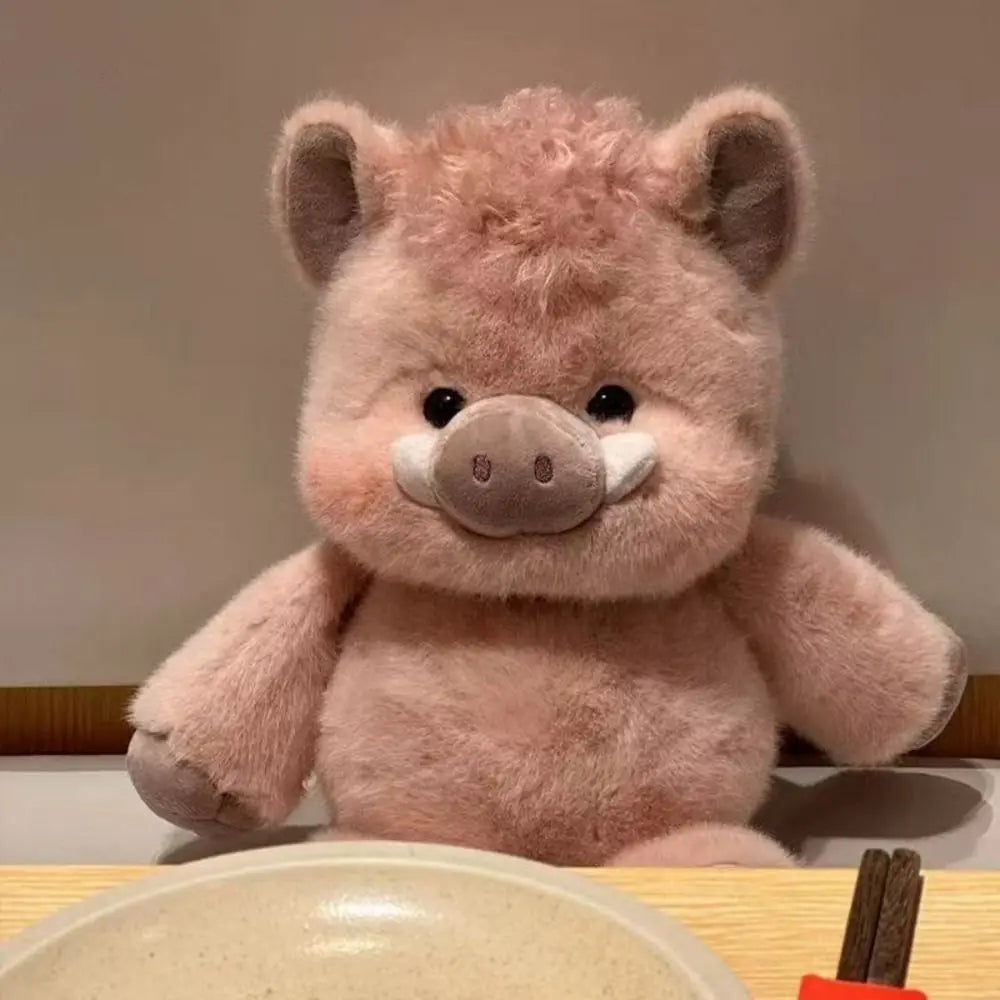 Schweinchen-Plüschkissen