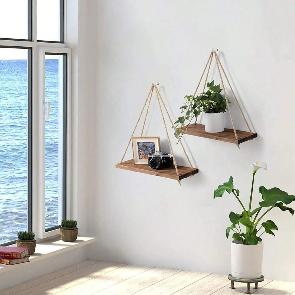 Hanging shelf made of natural wood with hemp rope