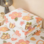 Wärmende Fleece-Decke mit Blumenmuster