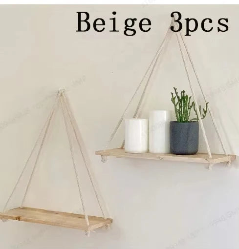 Hanging shelf made of natural wood with hemp rope